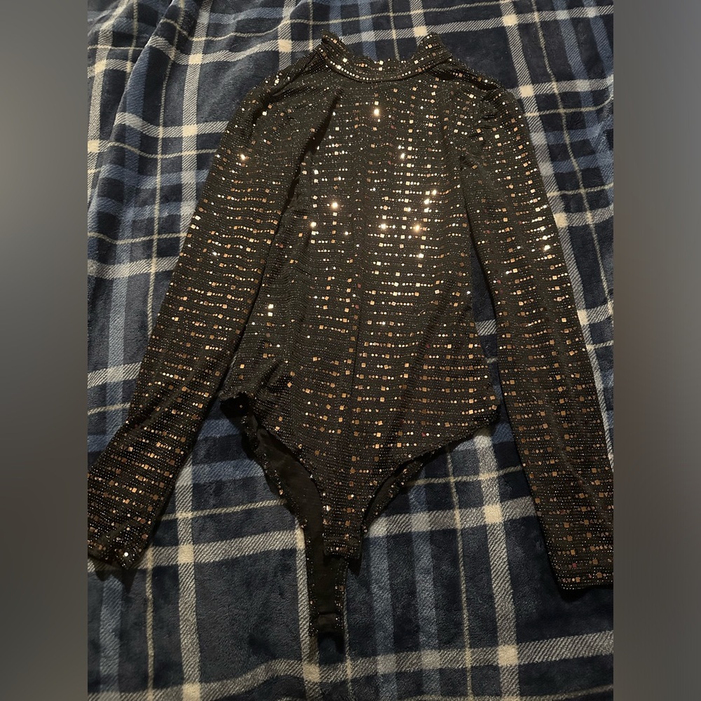 Shiny body suit